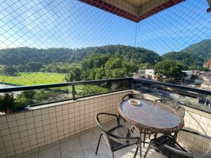 Apartamento 2 dormit�rios com su�te, pr�dio com piscina no Canto do Forte